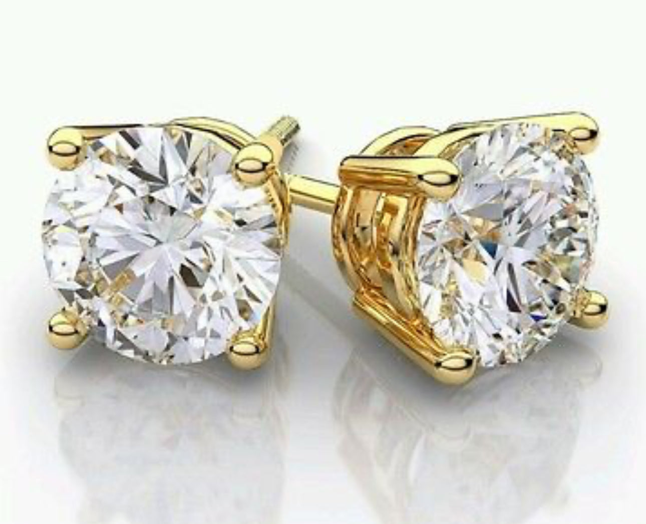 4.12 ctw GIA certified round diamond earrings